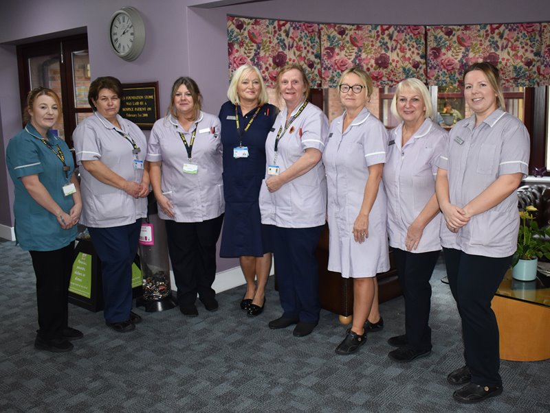Lindsey Lodge Operational Matron Karen Andrews (centre), is pictured with members of the Dignity Champions Team.