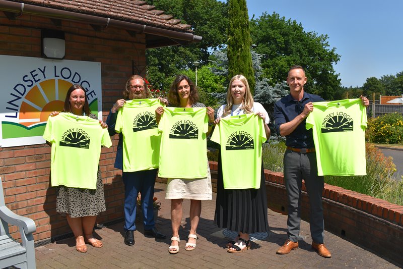 NHS North Lincolnshire Place Director Alex Seale (centre) is pictured with some of the team members aiming to take on the Yorkshire Three Peaks Challenge in July.