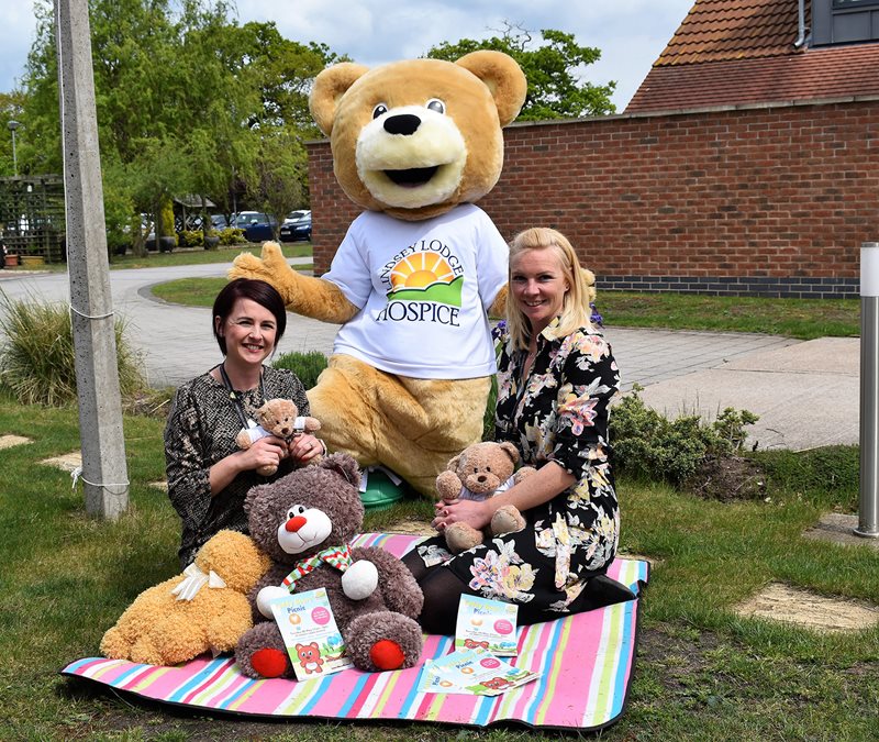 Hospice Fundraiser Selina Doyle (right) and Fundraising Assistant April Buttrick (left) are pictured with Lindsey Bear at the Hospice.