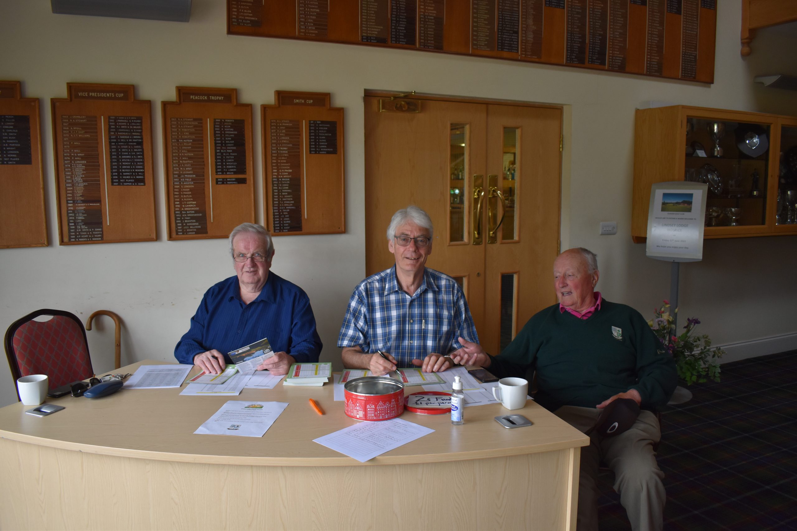 men at desk